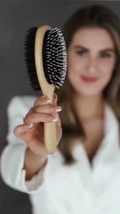 Yannai holding the Label May brush